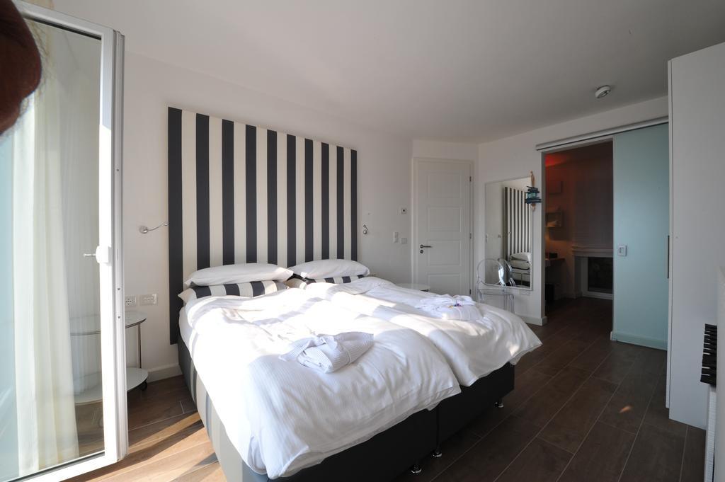Zeno Suites San Zeno di Montagna Phòng bức ảnh